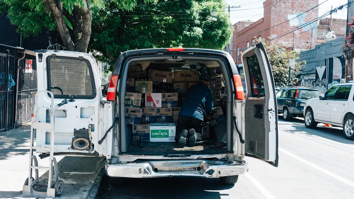 A work van loaded up with its back doors open