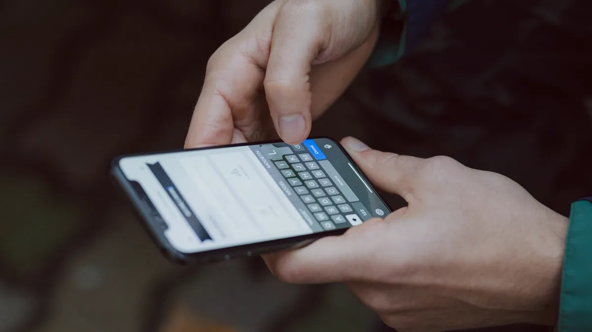 Someone checking a search on their phone